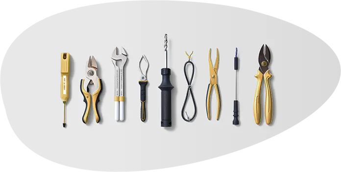 Série d’outils alignés, illustrant les outils du webmaster pour gérer et optimiser un site.